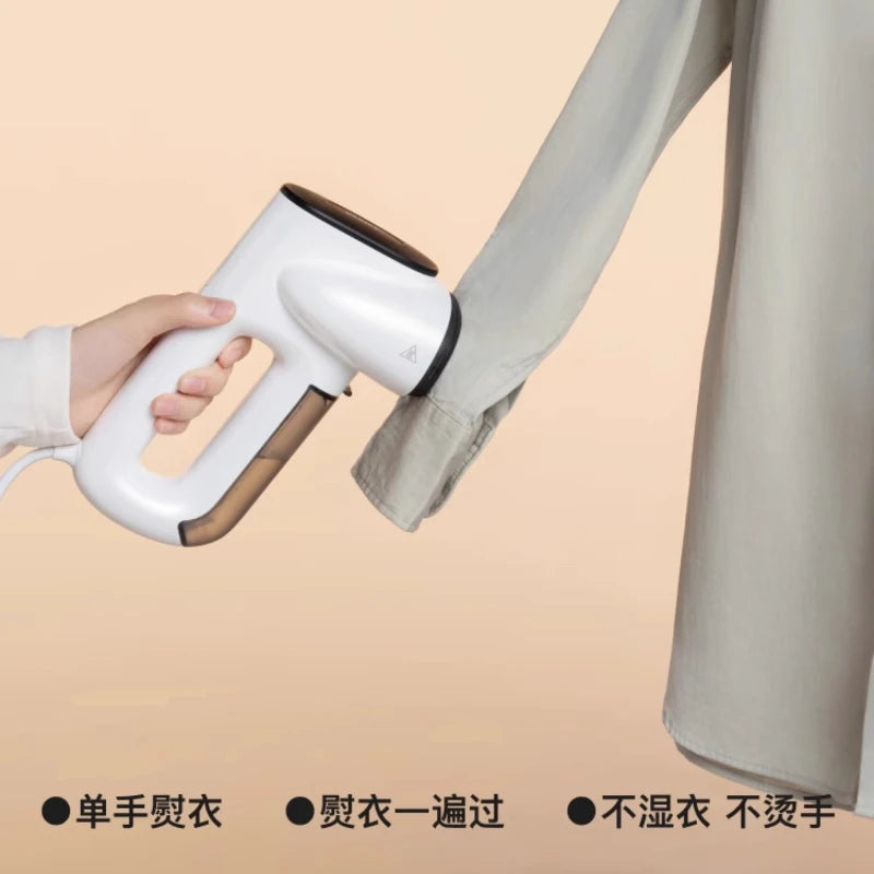 Portable steam iron with strong suction